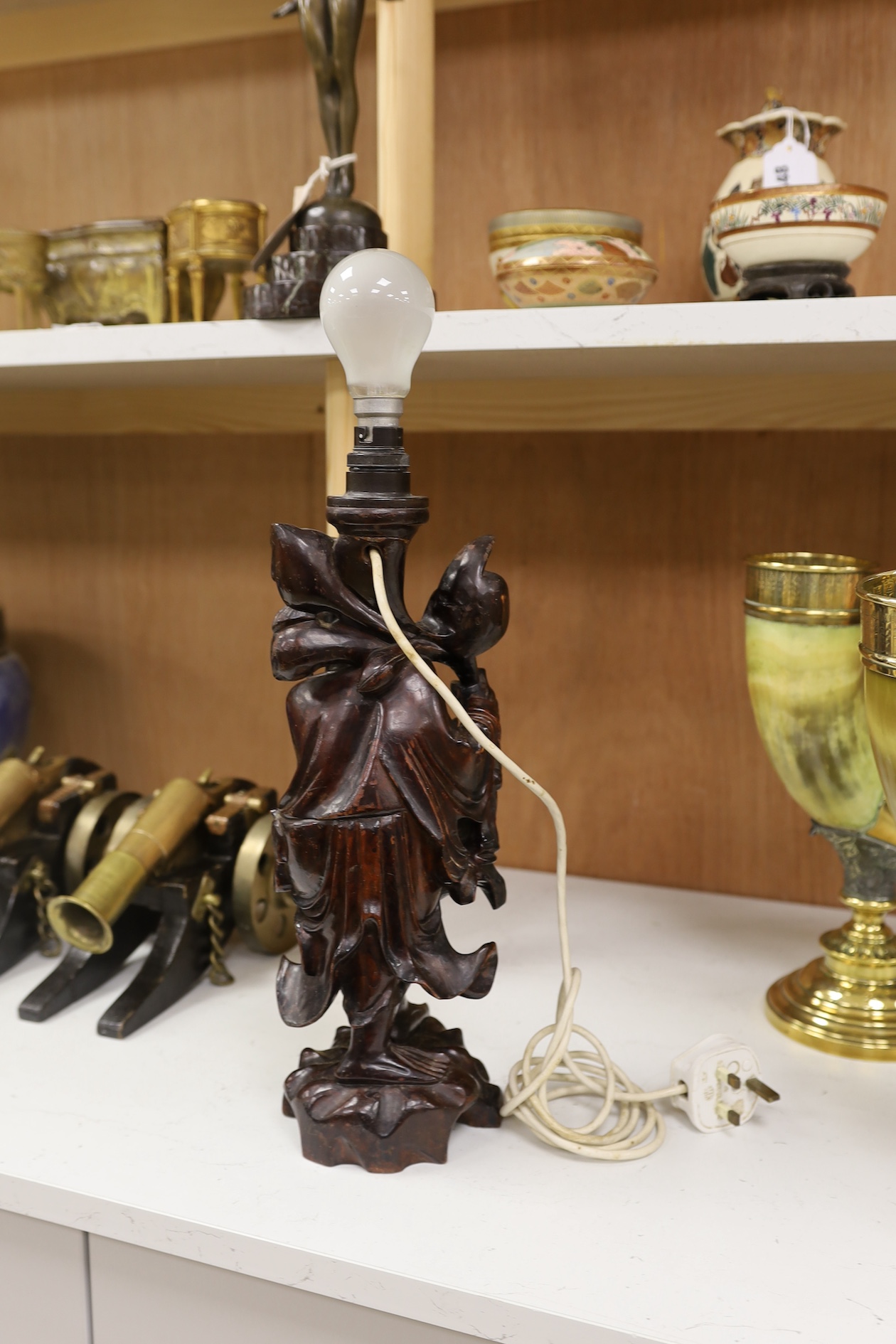 A Chinese carved wooden figural table lamp base, 36cm high not including light fitting. Condition - rubbed in places.